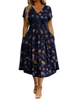 Dionne - Damesjurk met V-hals, bloemenprint en gedraaide taille