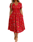Dionne - Damesjurk met V-hals, bloemenprint en gedraaide taille
