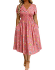 Dionne - Damesjurk met V-hals, bloemenprint en gedraaide taille