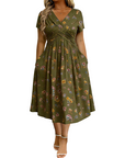 Dionne - Damesjurk met V-hals, bloemenprint en gedraaide taille