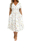 Dionne - Damesjurk met V-hals, bloemenprint en gedraaide taille
