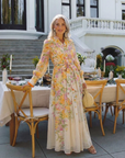 Cressida | Maxidress met bloemenprint en transparante stof met lange mouwen